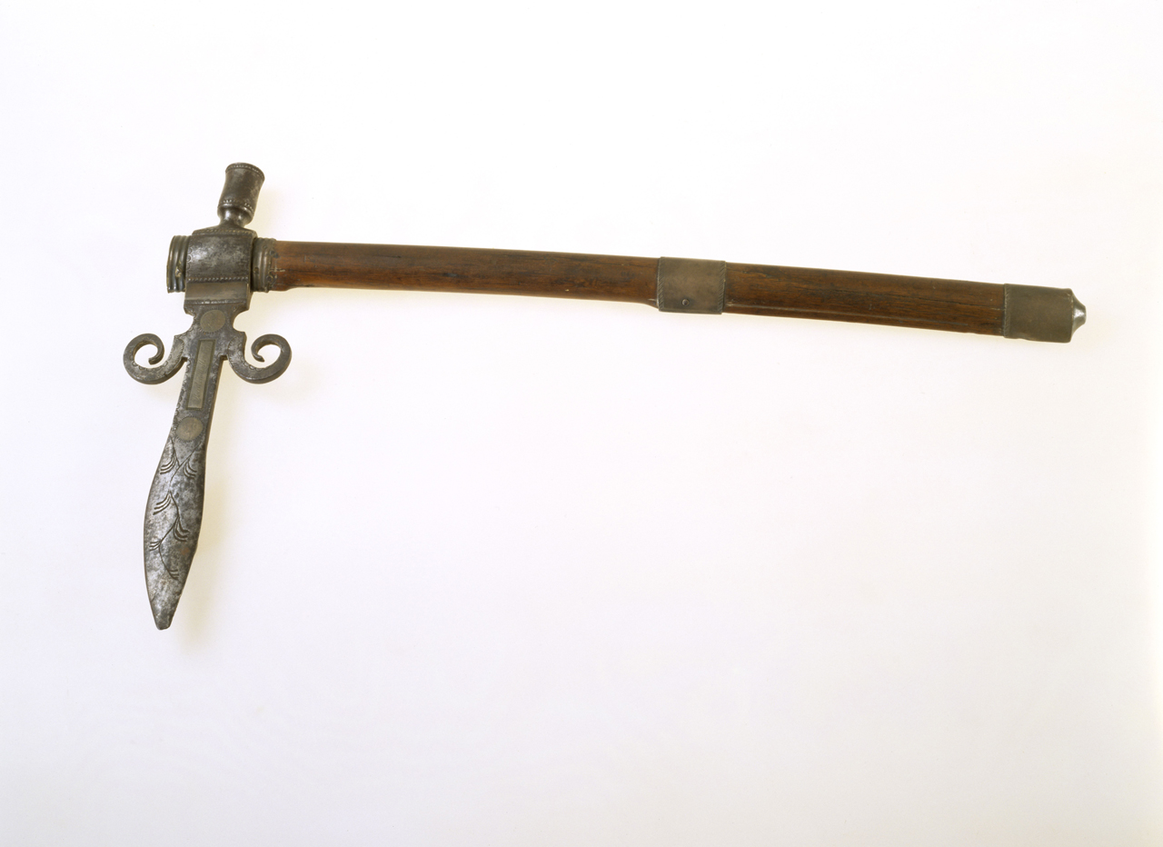 Ornate pipe tomahawk, engraved in 1818, made for presentation. Lewis carried his own pipe tomahawk to smoke with the Indian people he encountered, and he purchased others as gifts for tribal leaders. Wood and metal, North America.