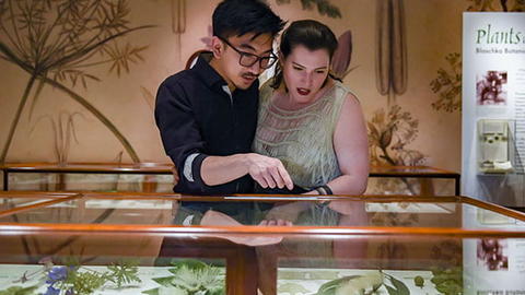 man and woman in glass flowers gallery.