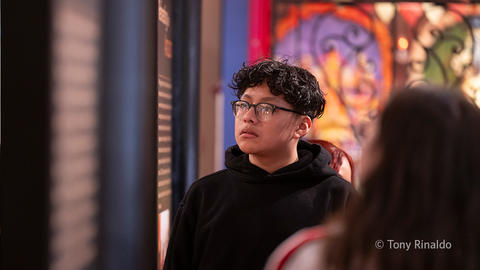 students in colorful gallery.