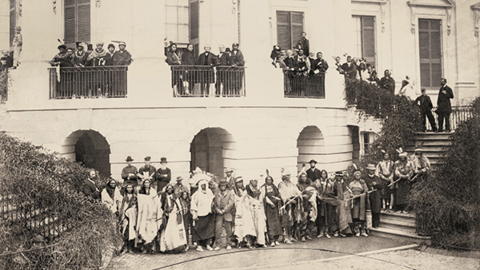Large Group of Delegates and Non-Natives on Steps of White House, Some in Partial and Native Dress.