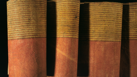 softly pleated tapa cloth.