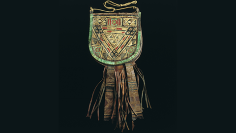 man's leather bag with fringes.