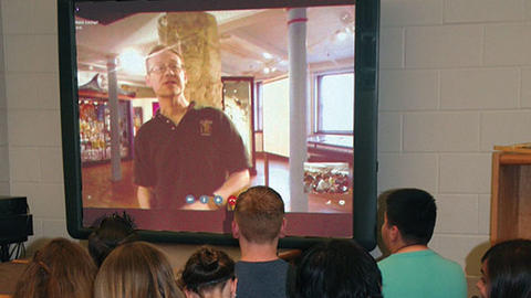 virtual classroom with educator in gallery.