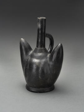 Black ceramic vessel with a stirrup spout