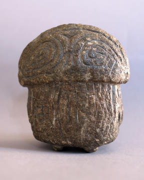 Carved stone artifact