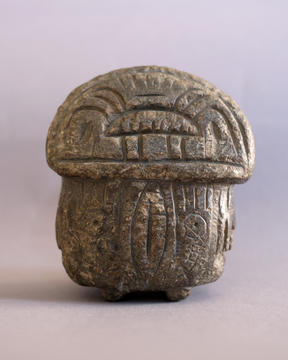Carved stone artifact