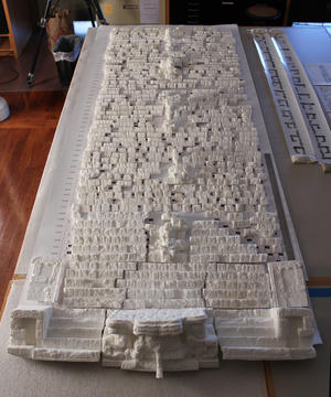 small white plastic blocks of a long inscription on a table