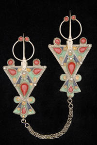 Triangular brooches.