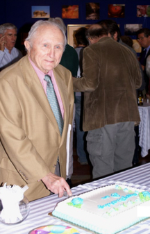 dan jones cuts cake.