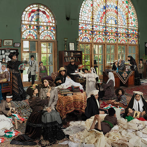 women gathered in large hall.