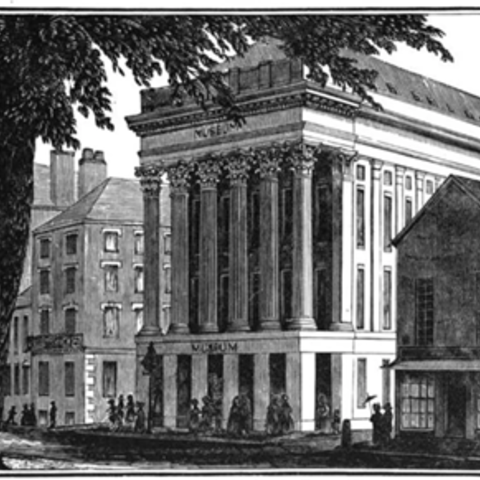 Black and white image of imposing building with columns