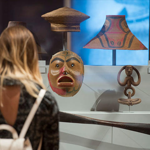 visitor in China trade section of gallery.