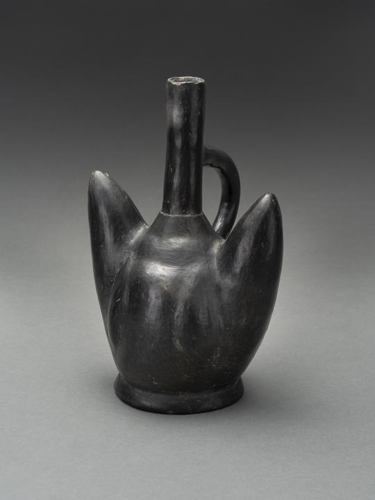 Black ceramic vessel with a stirrup spout