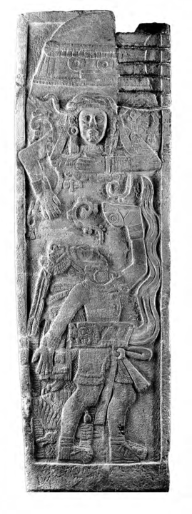 Basalt bas-relief carving with figures