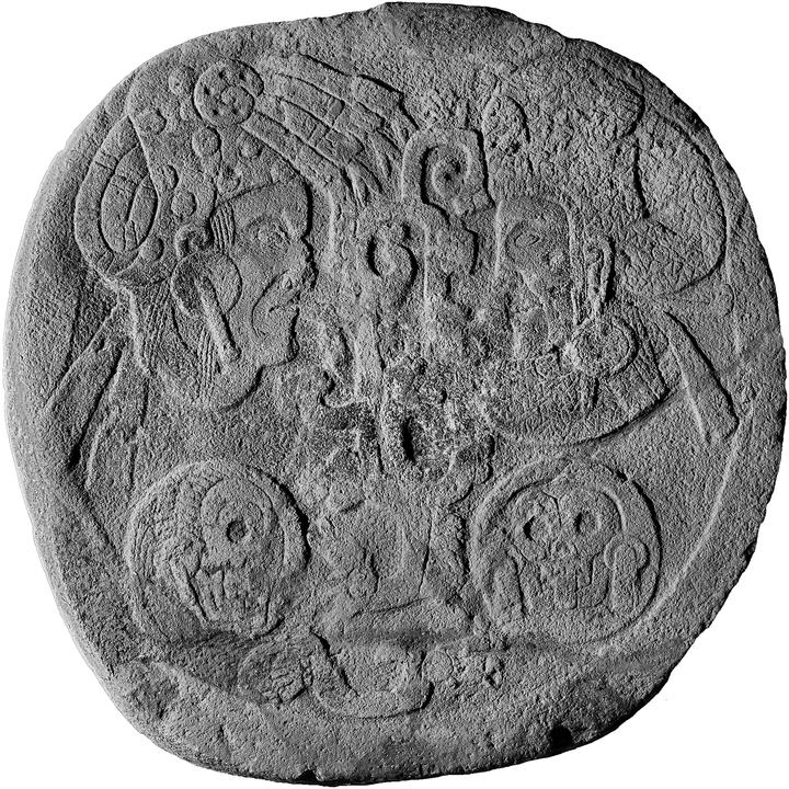 Basalt bas-relief carving with figures