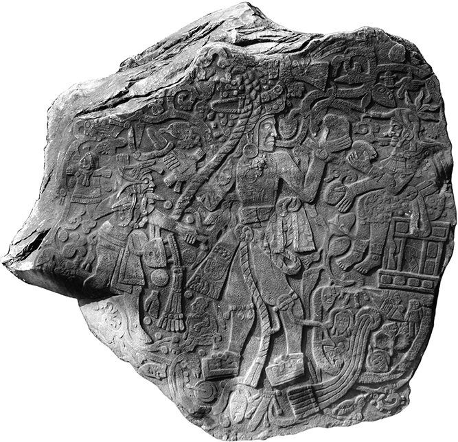 Basalt boulder bas-relief carving with figures