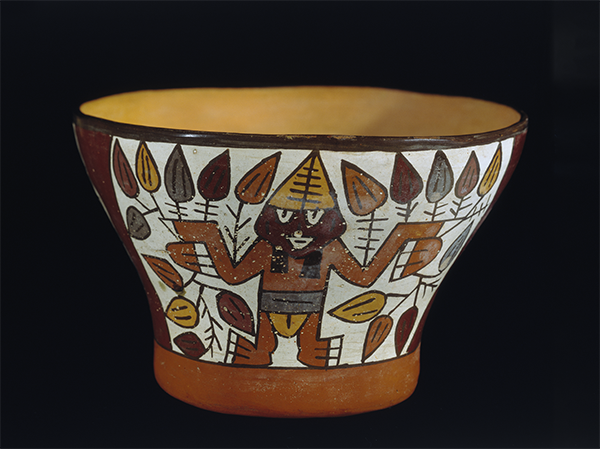 Middle Nasca bowl depicting the Harvester, a farmer clutching agricultural plants in his hands, from the southern coast of Peru. Museum Purchase, 32‐30‐30/71