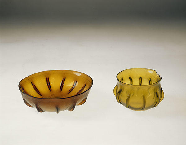 Early Roman glass dishes excavated from Vinica,&nbsp;North Macedonia.&nbsp;Museum Purchase, 40-77-40/12521
