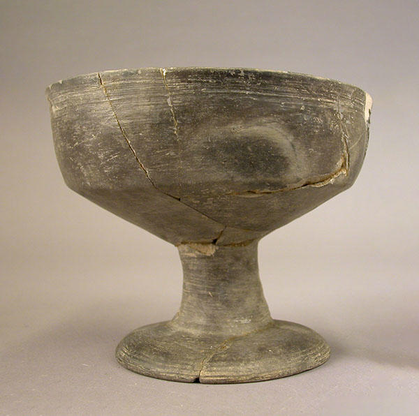 West Turkestani Bronze Age style ceramic pedestal bowl excavated from Tepe Hissar in northeastern Iran.&nbsp;Gift of The University Museum, University of Pennsylvania, 41‐1‐60/7095
