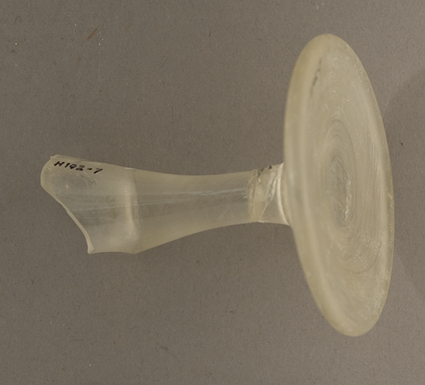 Base and stem of clear glass goblet, excavated from Harvard Yard in the 1980s. Harvard Yard Excavations, 1984‐1987, 987‐22‐10/100192