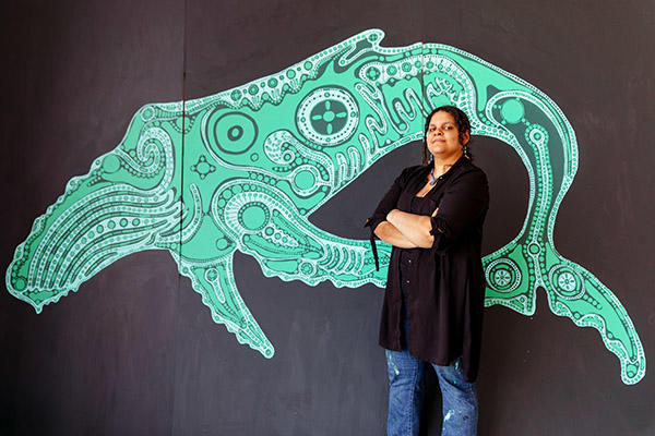 andromeda lisle and her mural.