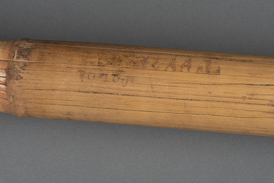 detail of headrest with name carving.