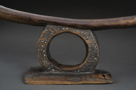inlaid decoration on wooden headrest.