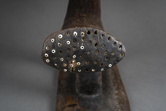 inlaid decoration in wooden headrest.