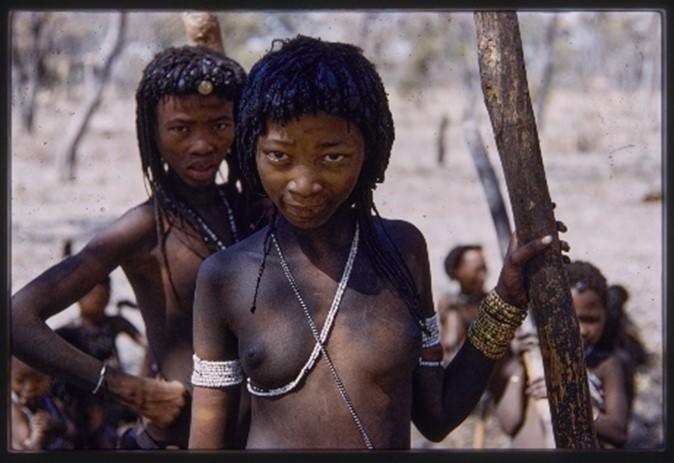 Two woman standing together looking at the camera