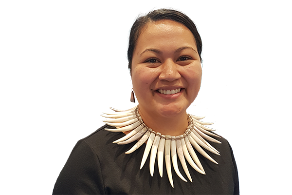 Laneta Fitisemanu, smiling, wears nifo aila.