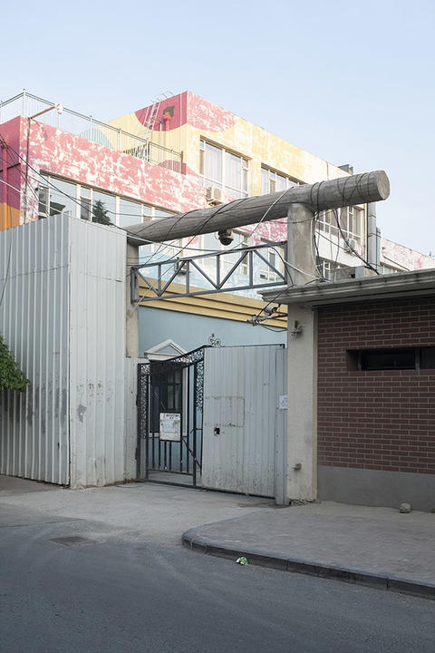 buildings and closed gate.