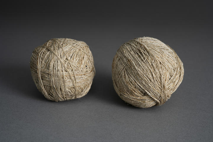 balled Skeins of prepared cotton or linen fiber.