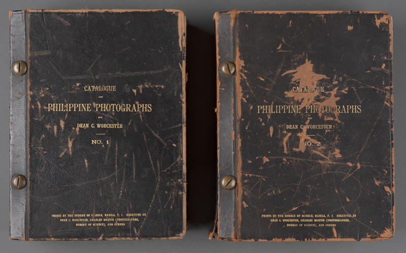 two catalogues of worcester's philippine photographs side by side.