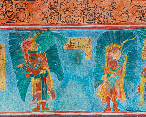 detail of colorful maya mural with elaborately dressed people and glyphs.